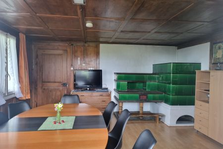 Wohnzimmer mit Kachelofen